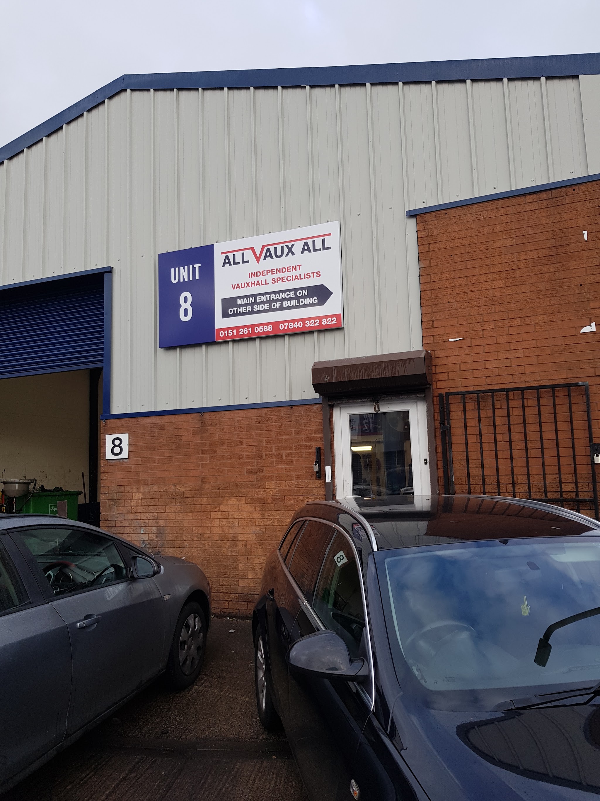 The front of Unit 8 on Castor Street with the All Vaux All sign and the roller door open into the workshop